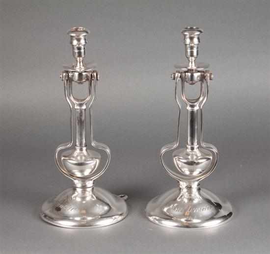 Appraisal: Pair of silver-plated cast bell metal swinging ship's candlesticks from