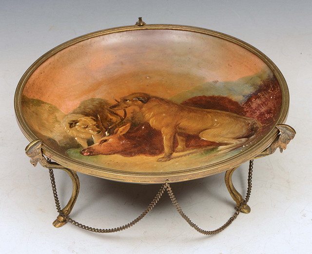 Appraisal: A PAPIER MACH CIRCULAR TAZZA decorated hunting scene entitled 'After