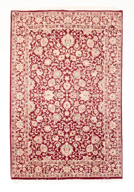 Appraisal: th century Hand knotted wool with floral pattern and red