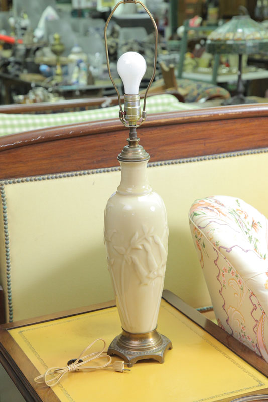 Appraisal: ROOKWOOD TABLE LAMP Embossed floral decoration with an ivory high