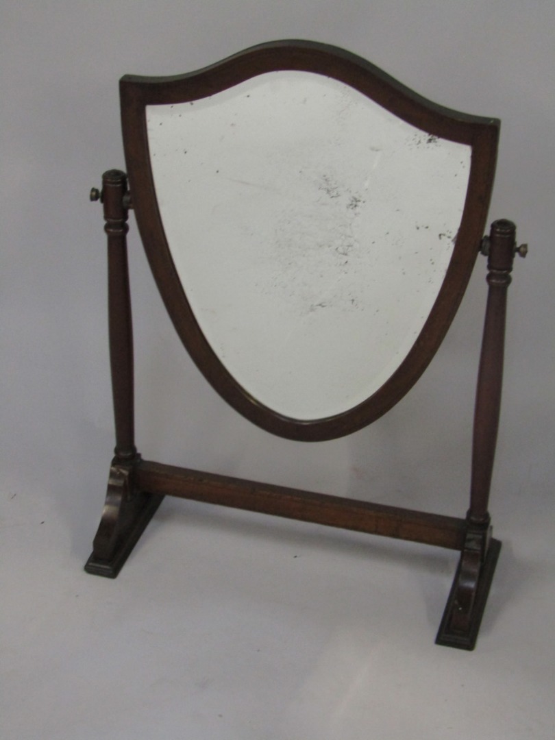 Appraisal: An Edwardian mahogany and line inlaid swing frame toilet mirror