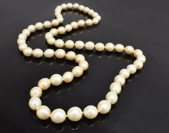 Appraisal: Vintage Chanel faux pearl necklace sixty-four faux pearls on knotted