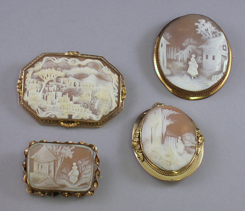 Appraisal: Four Landscape and Genre Scene Shell-carved Cameos