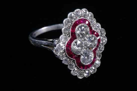 Appraisal: EDWARDIAN PLATINUM DIAMOND AND RUBY RING Quatrefoil arrangement of four