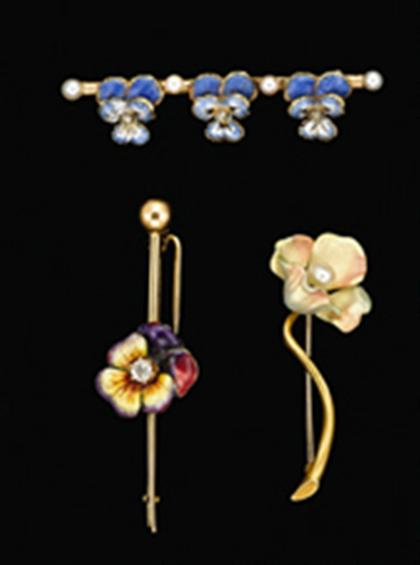 Appraisal: Group of three gold and enamel flower bar brooches The