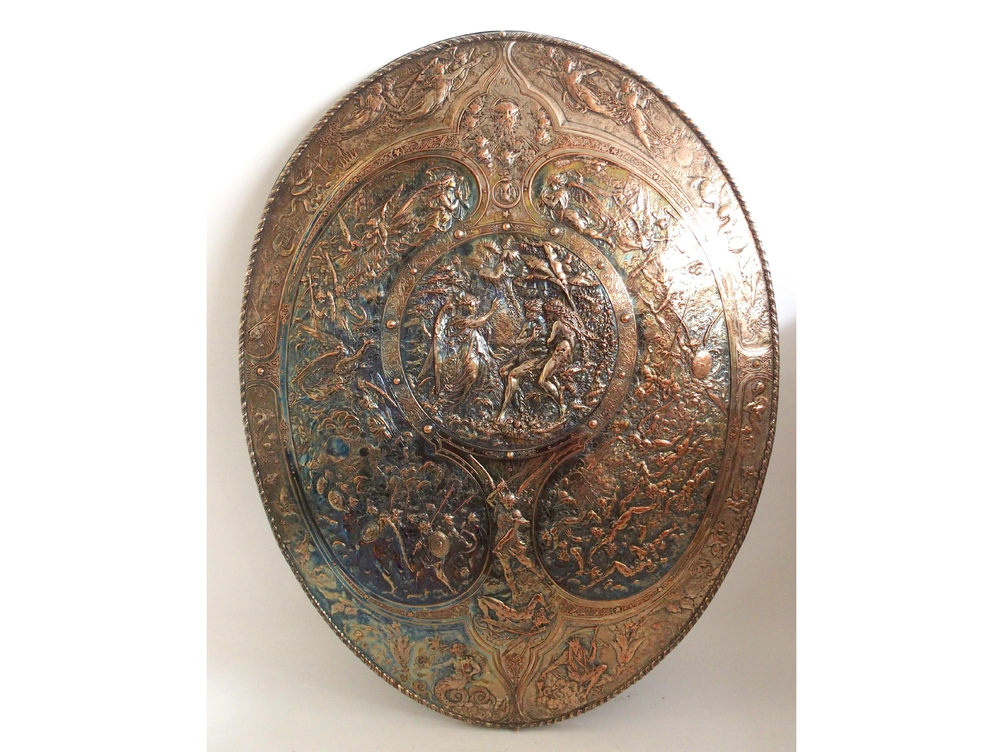 Appraisal: An exceptional th Century Elkington Company oval shielddepicting biblical scenes