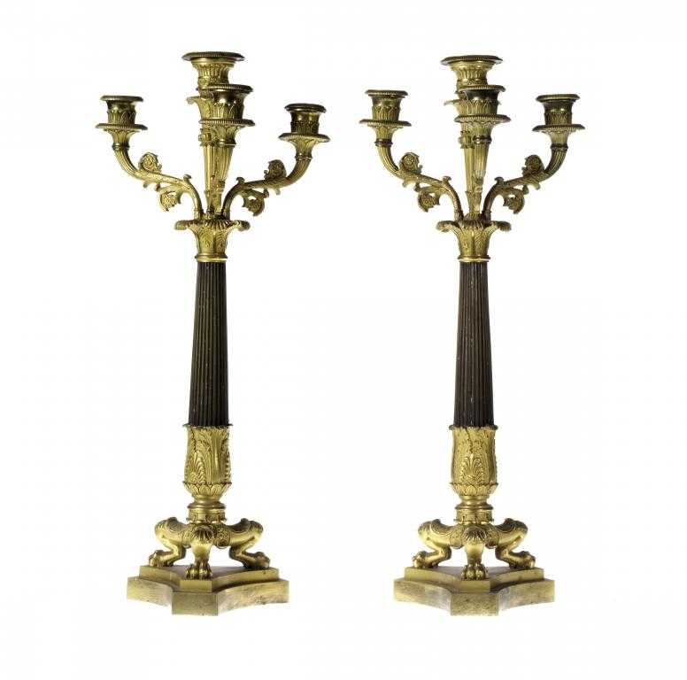 Appraisal: A PAIR OF LOUIS PHILIPPE GILT AND PATINATED BRONZE CANDELABRA