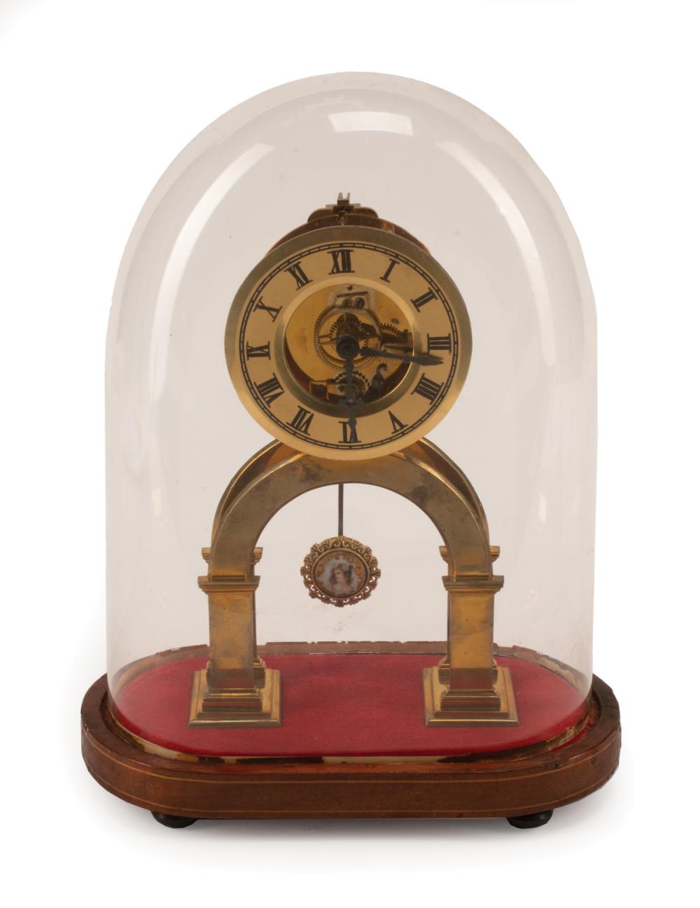 Appraisal: French Skeleton Clock glass dome wood base associated hands and