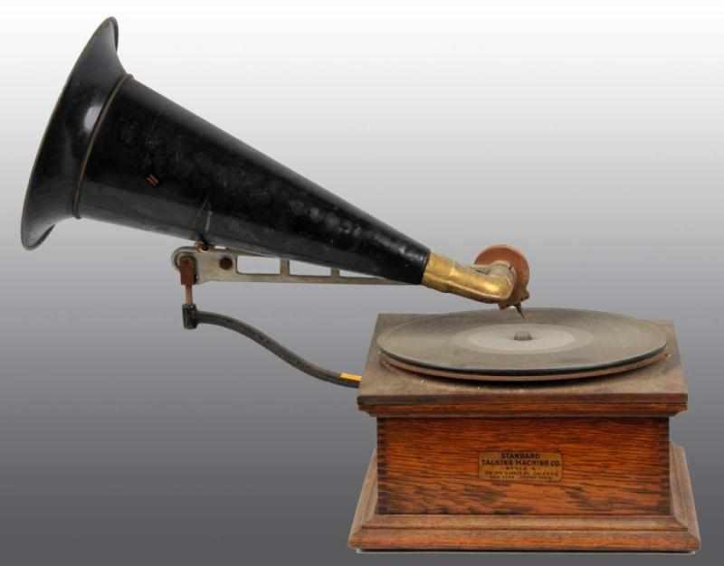 Appraisal: Style X Standard Talking Machine with Metal Horn Description Some