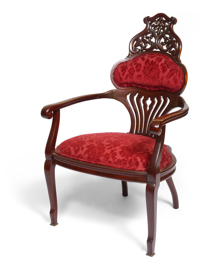 Appraisal: ROSEWOOD ART NOUVEAU ERA ARM CHAIR Extended carved and pieced