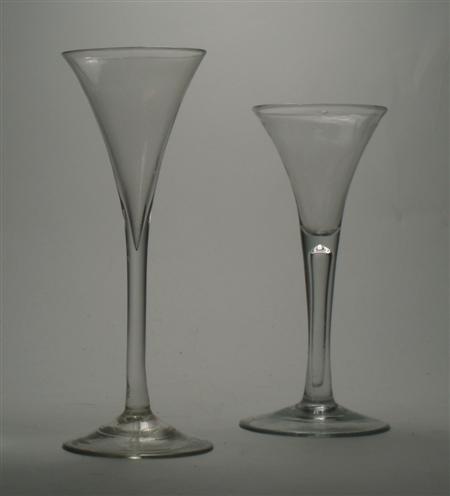 Appraisal: An th century plain toasting glass with trumpet bowl and