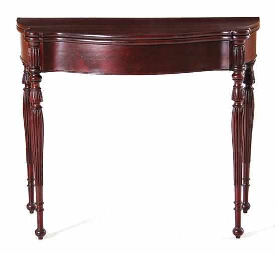 Appraisal: Sheraton style carved mahogany games table late th century serpentine