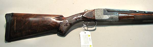 Appraisal: A gauge Ithaca Model E single barrel trap gun Serial