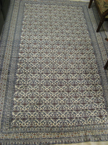 Appraisal: HAND KNOTTED ORIENTAL AREA RUG Pakistani Bokhara overall field of