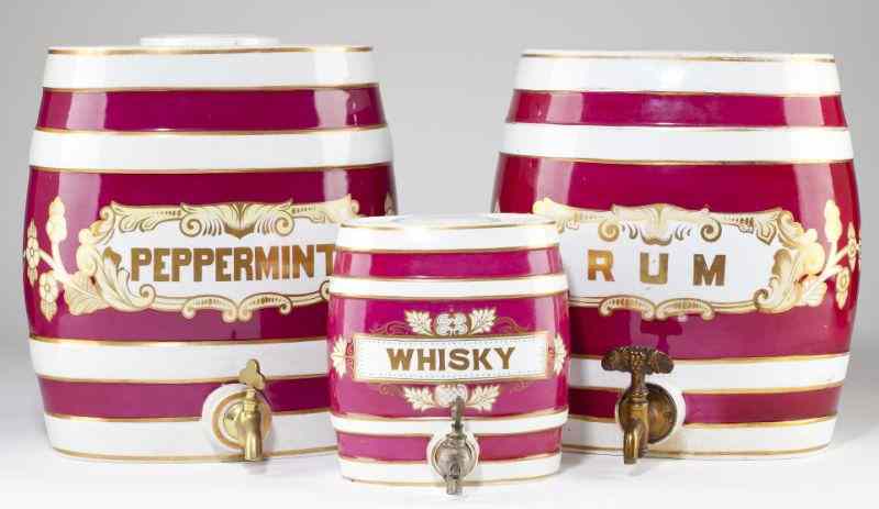 Appraisal: Three Piece Ironstone Dispenser SetEnglish ''Whiskey'' in and ''Peppermint'' and