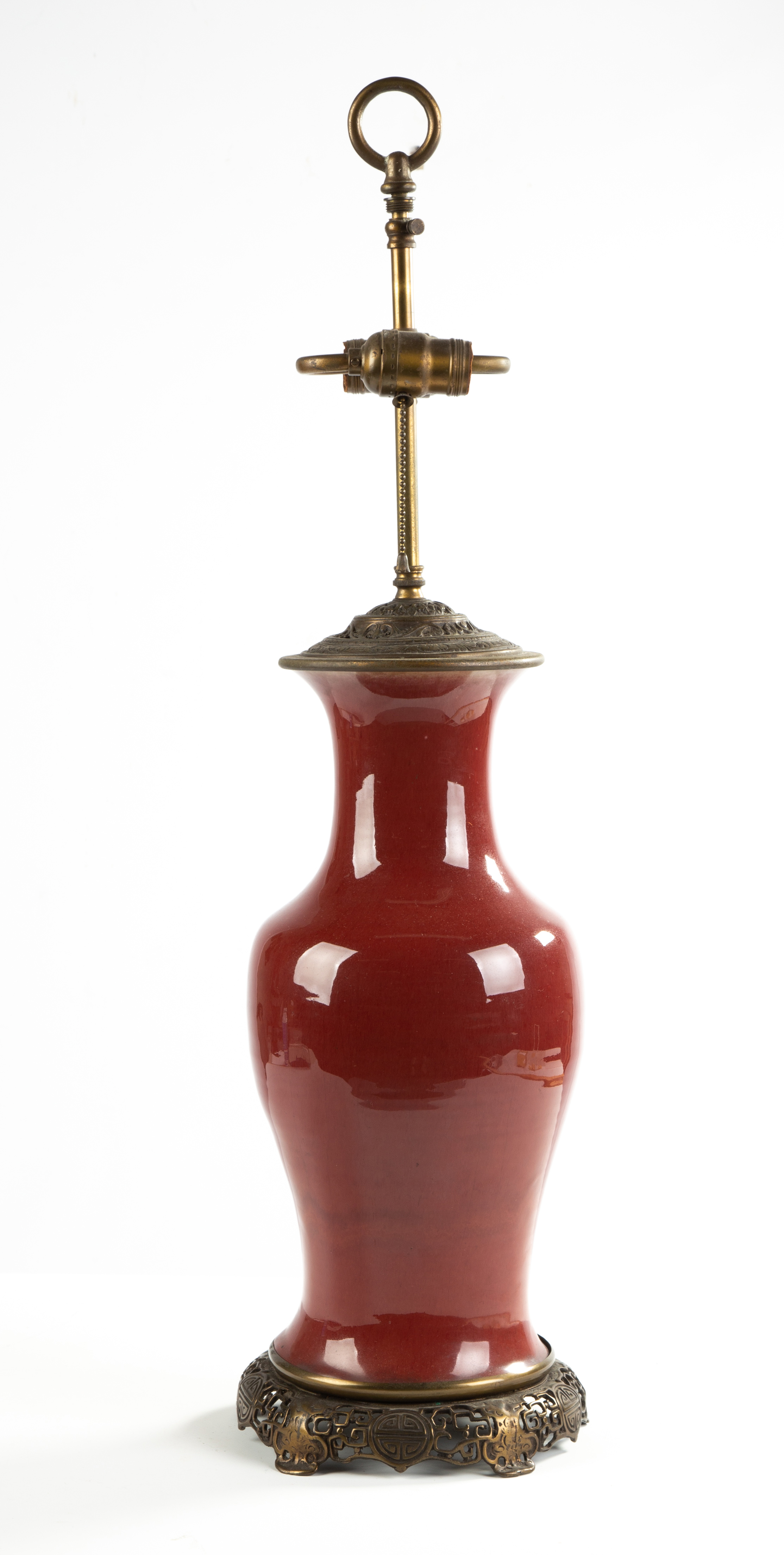 Appraisal: CHINESE PORCELAIN OXBLOOD LAMP BASE with bronze mounts