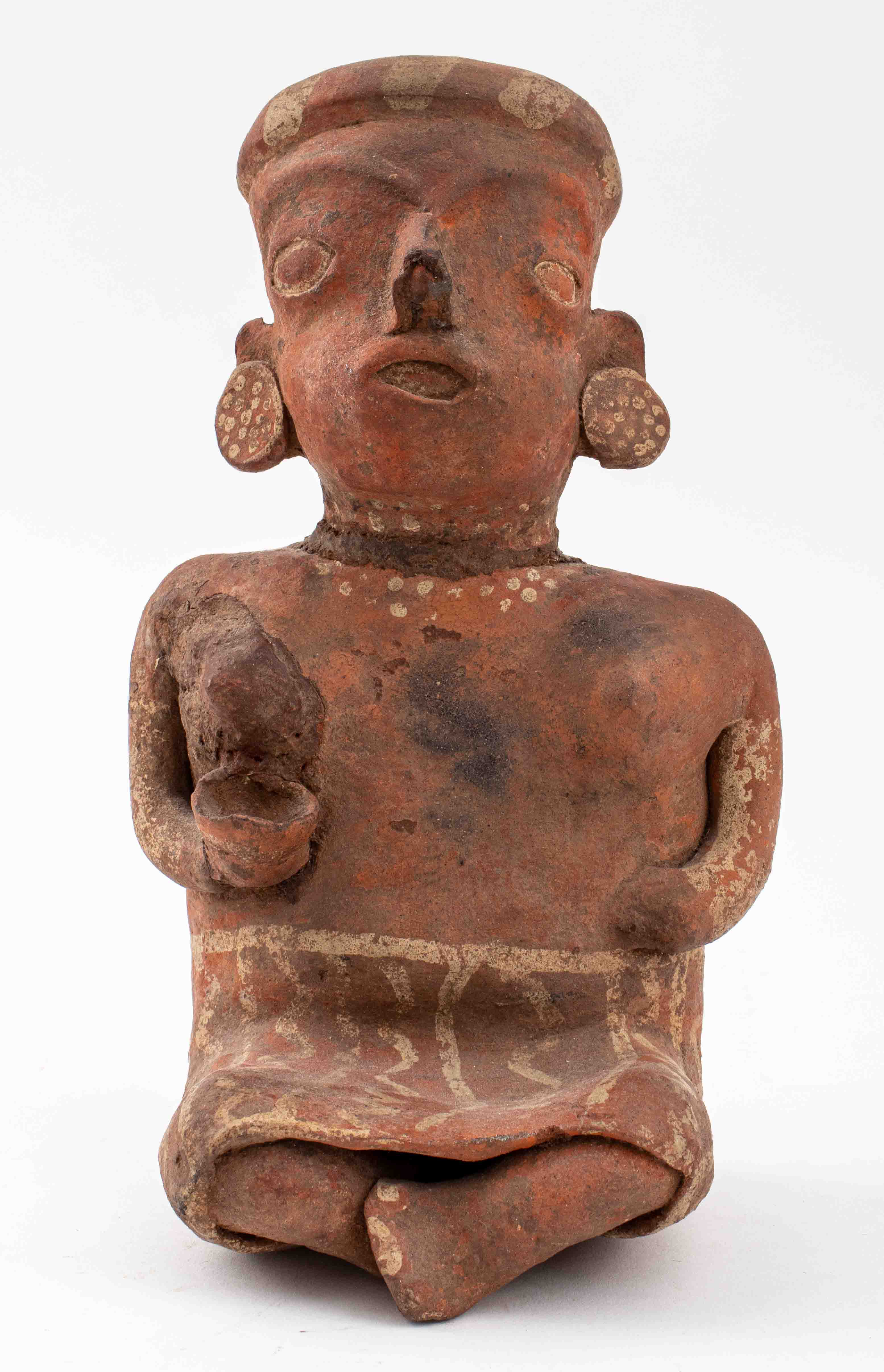 Appraisal: PRE-COLUMBIAN NAYARIT SEATED FEMALE FIGURINE Pre-Columbian Nayarit ceramic pottery seated