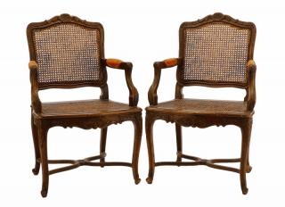 Appraisal: Pair Provincial Style Caned Fauteuils Continental second half th century