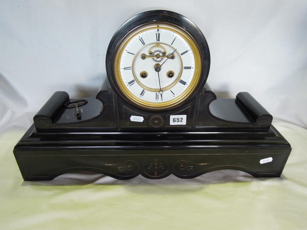 Appraisal: A substantial late th century black slate mantle clock with