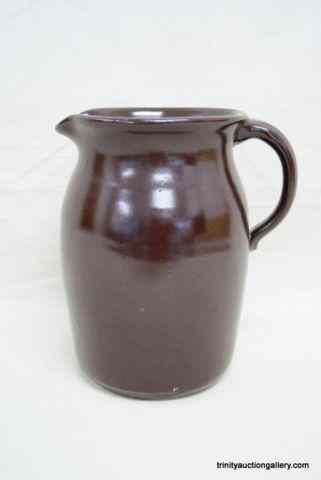 Appraisal: Vintage Brown Glazed Crock PitcherIs a large ounce size in