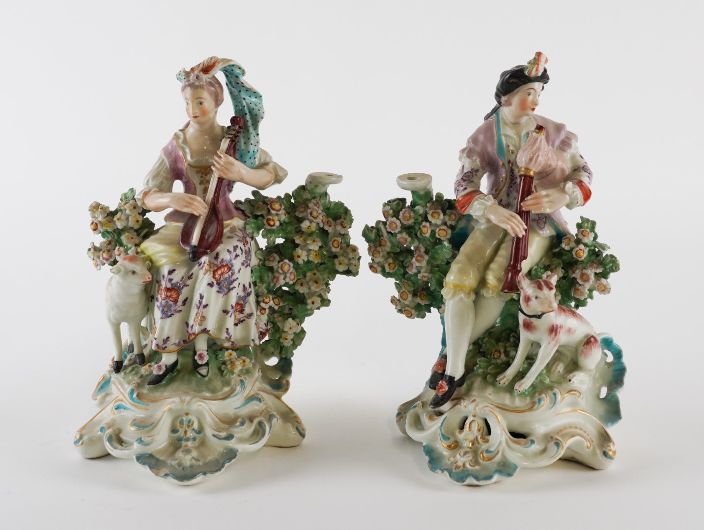 Appraisal: A PAIR OF DERBY MUSICIAN CANDLESTICK FIGURES Circa - Modelled