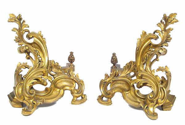 Appraisal: A pair of Louis XV style gilt bronze chenets late