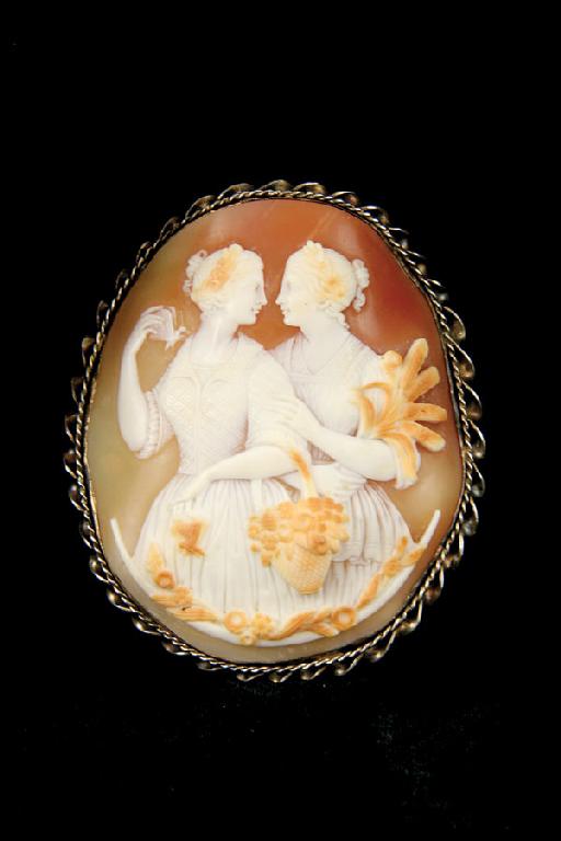 Appraisal: A large carved shell Cameo Brooch the oval plaque carved