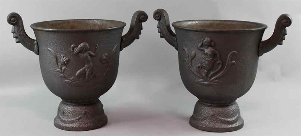 Appraisal: PAIR OF MODERNIST CAST IRON URNS of globular form with