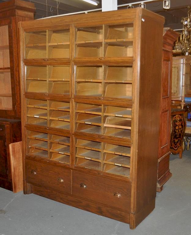 Appraisal: Large Vintage Oak Lawyer Type File Cabinet having eight glass