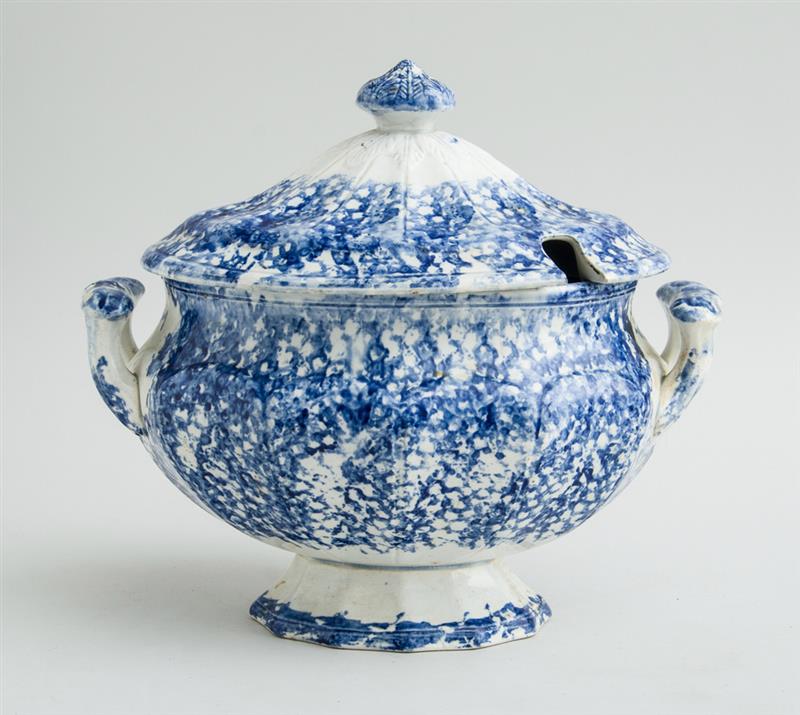 Appraisal: ENGLISH BLUE SPONGEWARE TWO-HANDLED TUREEN AND COVER The ovoid paneled