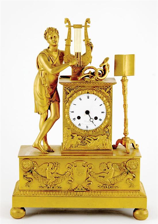 Appraisal: French gilt-bronze figural mantel clock circa heraldic figure with lyre