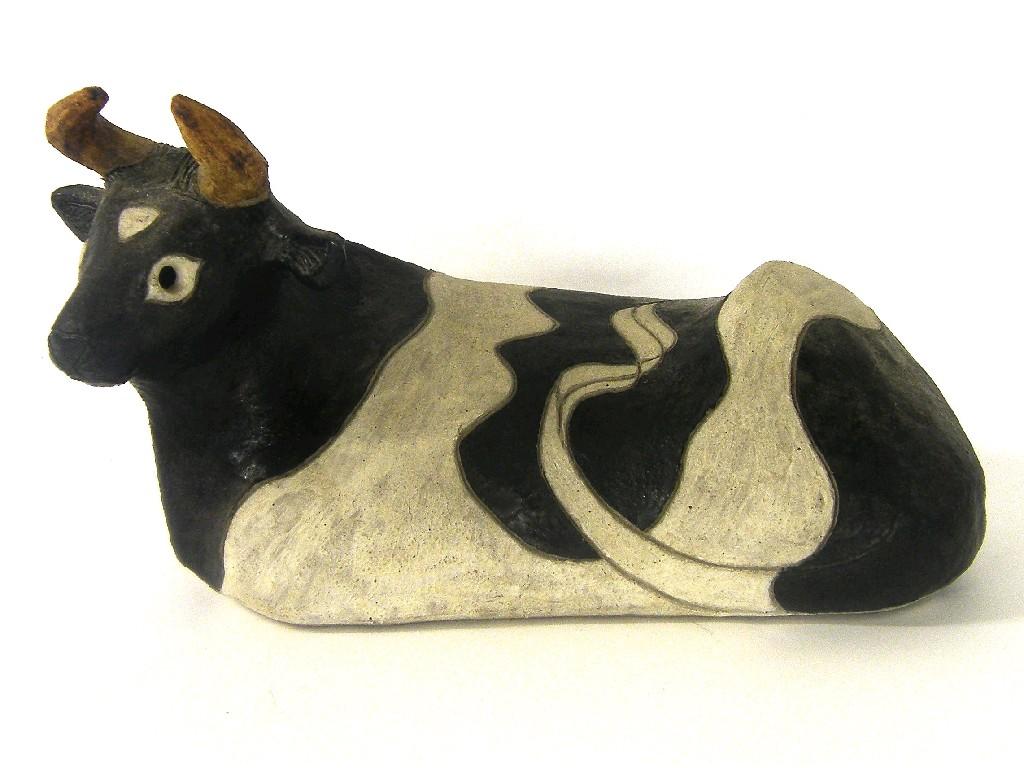 Appraisal: Rosemary Wren Oxshott Pottery model of a recumbent black and