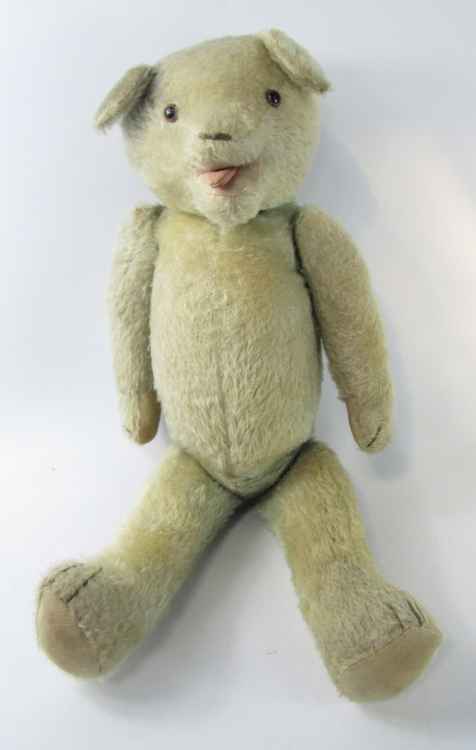 Appraisal: A mid thC blonde plush teddy bear with open mouth