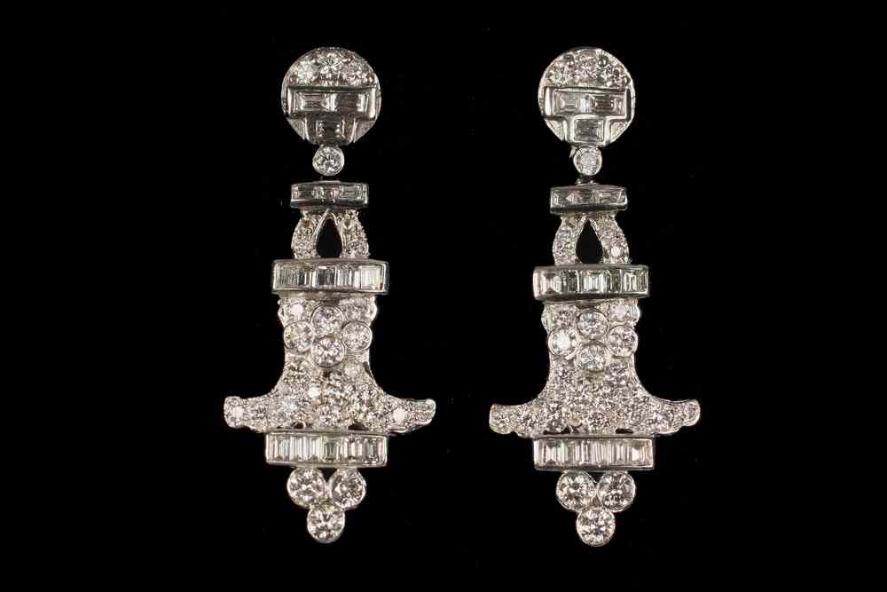 Appraisal: EARRINGS - One pair of platinum and diamond earrings circular