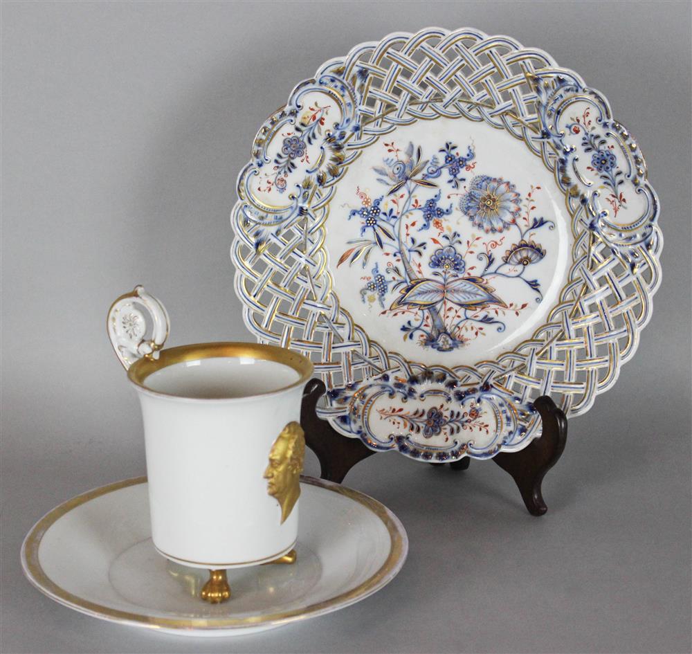 Appraisal: MEISSEN CUP AND SAUCER AND A RETICULATED PLATE cancelled blue