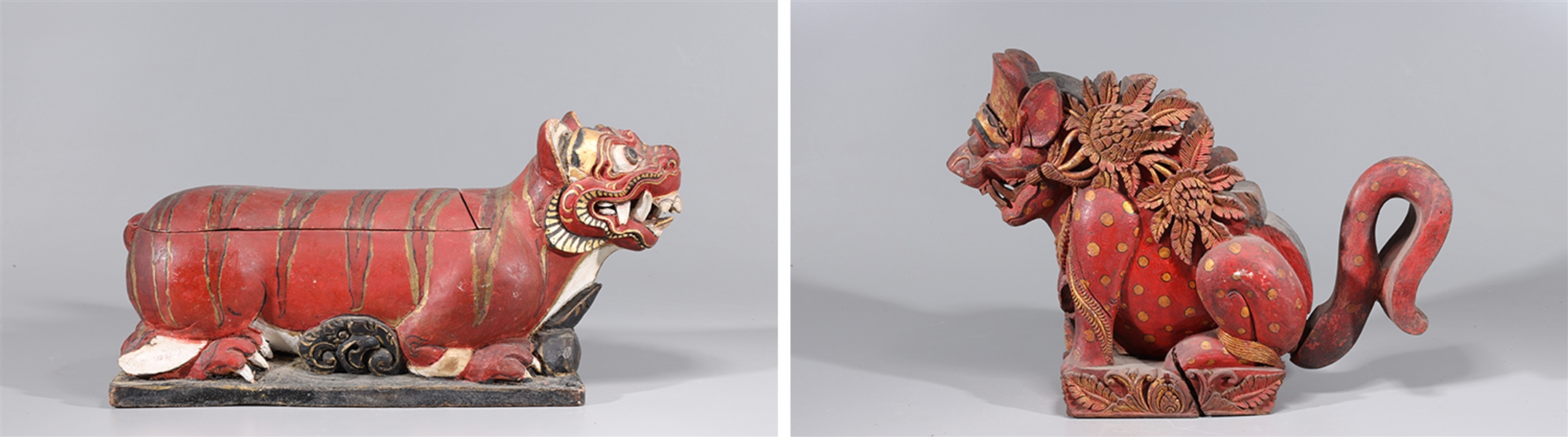 Appraisal: Pair of antique Chinese wood animals with gilt and intricately