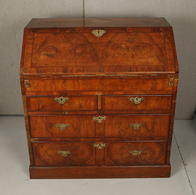 Appraisal: AN TH CENTURY WALNUT BUREAU the interior with well central