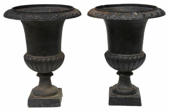 Appraisal: pair Classical style cast iron garden urns th c with