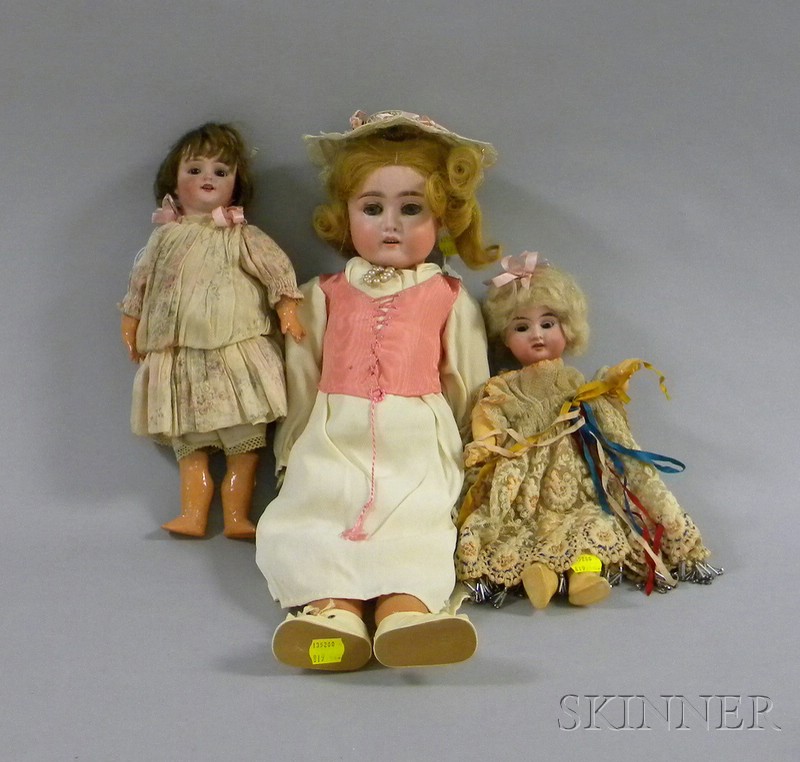 Appraisal: Three German Bisque Head Dolls with composition bodies one marked