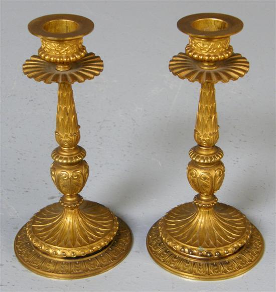 Appraisal: Pair of Hollenbach Wien gilt bronze candlesticks on foliate circular