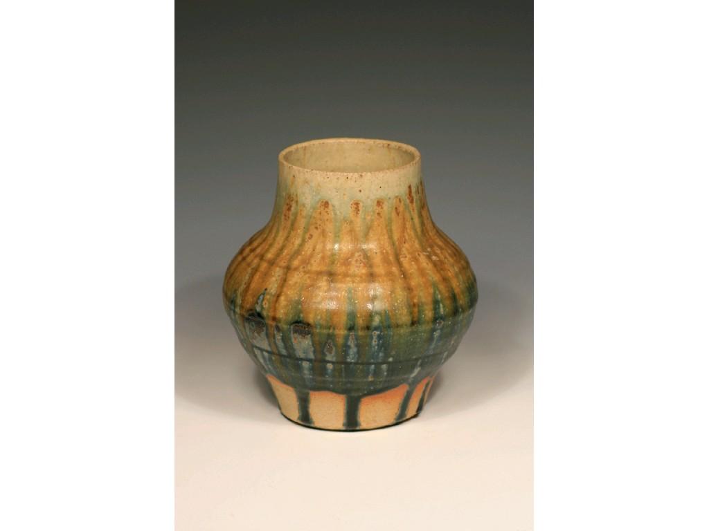 Appraisal: JAMES MELLON A STUDIO POTTERY VASE of baluster form trail