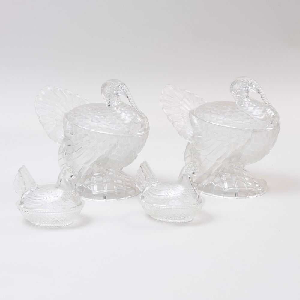 Appraisal: Two Pairs of Pressed Glass Bird Form Vessels and Covers