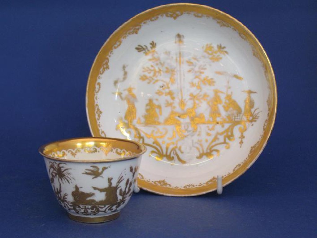 Appraisal: A MEISSEN BOTTGER GOLD CHINOISERIE TEA BOWL AND SAUCER painted