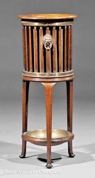 Appraisal: An Antique Oak and Brass Umbrella Stand slatted sides with