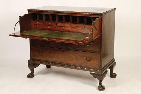 Appraisal: A GEORGE II STYLE MAHOGANY SECRETAIRE CHEST the rectangular top