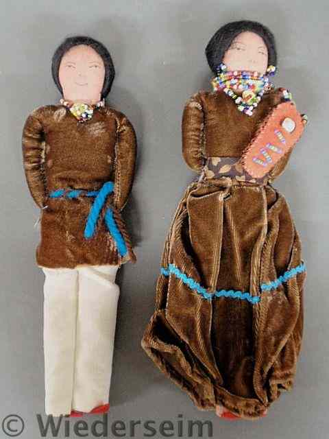 Appraisal: Pair of Navajo dolls c California with beadwork decorated clothing