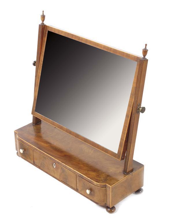 Appraisal: An early th century mahogany toilet mirror