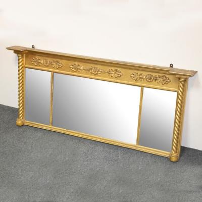 Appraisal: A Regency gilt framed overmantel mirror the frieze with anthemion