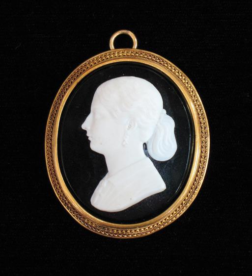 Appraisal: A BLACK AND WHITE CAMEO depicting a portrait profile of