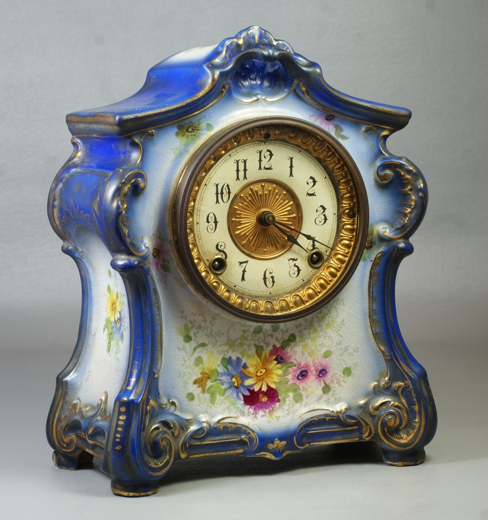 Appraisal: Ansonia La Fontaine Royal Bonn china case clock blue and